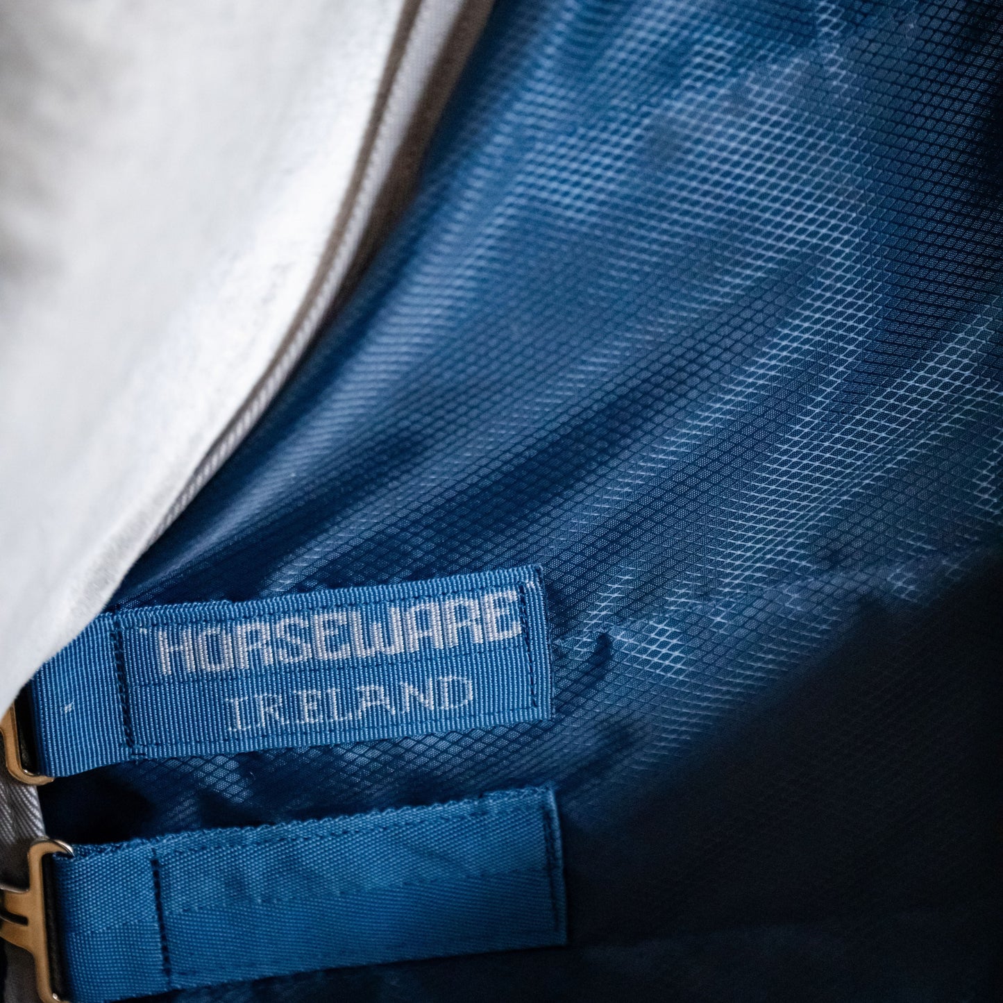 Horseware Ireland Ionic 50g Therapy Stable Rug #colour_imperial-blue-silver-navy